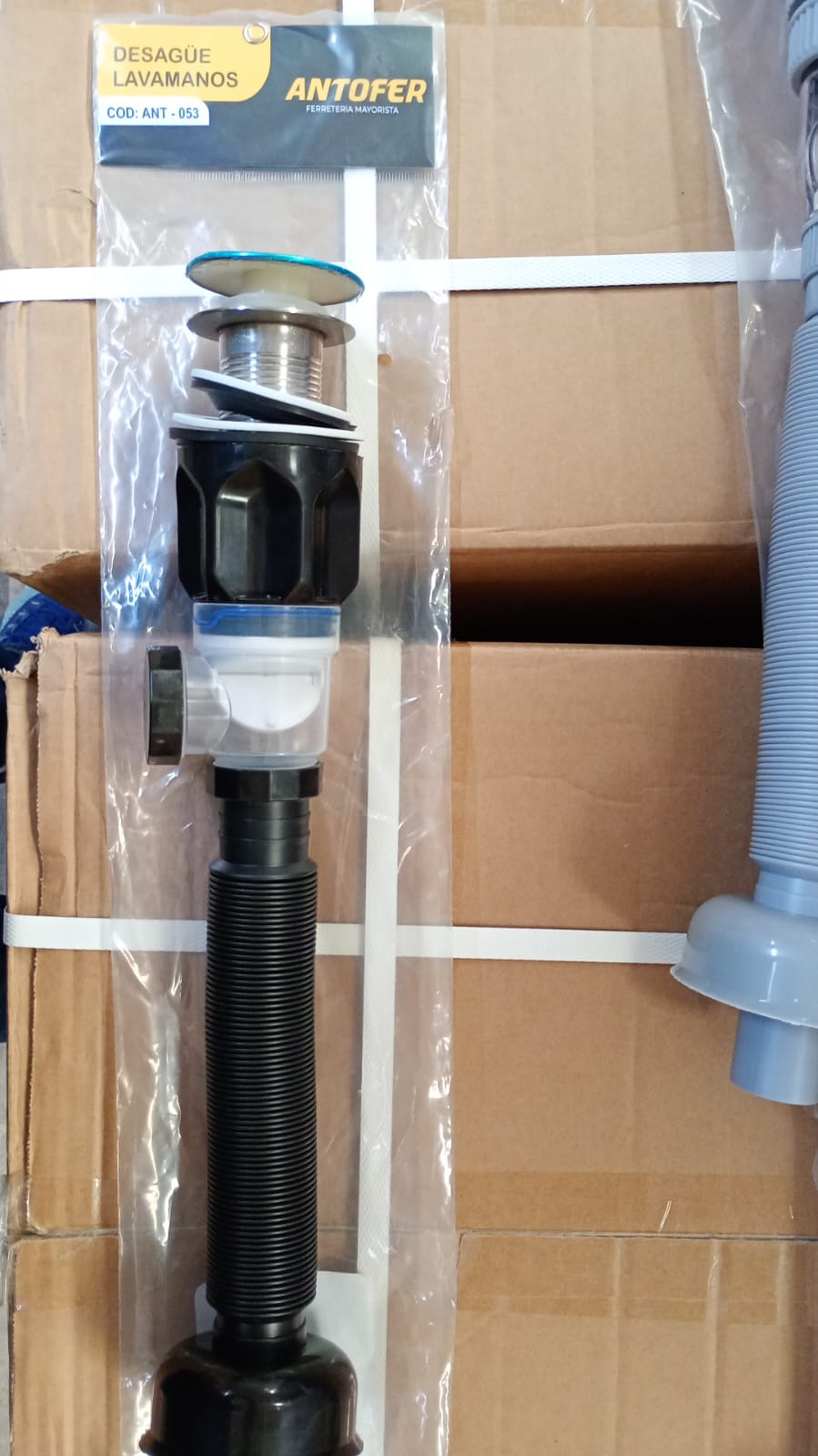 DESAGÜE NEGRO LAVAMANOS PUSH CON TAPÓN GRANDE ANTIOLOR, CAJA 50 UND